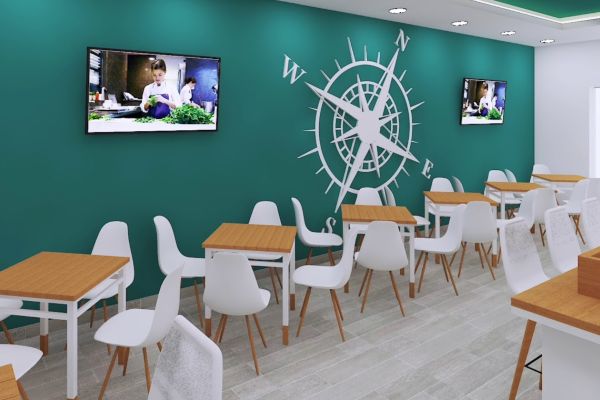 Pintores de restaurantes en Pamplona, Navarra · bar con pared turquesa y brújula